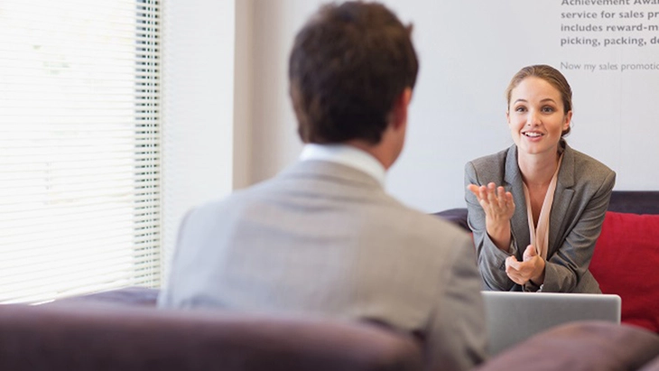 Candidate presenting company research during an interview